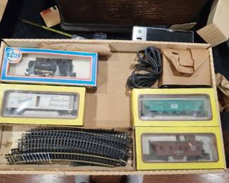 Model Power HO Diesel Ready‑to‑Run Electric Train Set – New Old Stock – Unused – Original Box  Vintage Model Power HO‑scale electric train set, complete and unused, still in the original box. This is true New Old Stock (NOS) — contents appear untouched and never assembled. Includes diesel locomotive, freight cars, track sections, power pack, and accessories. Packaging is clean and intact with clear display windows.  A great collectible for model railroad enthusiasts or anyone looking for a ready‑to‑run HO set in exceptional condition. Hard to find unused examples from this era.  Condition:  New Old Stock (unused)  Original box included  All components present  Box shows only minor shelf wear  Price: $75 Era: Late 1980s–1990s Includes: Locomotive, cars, track, power pack, accessories, original box