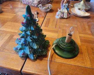 Vintage Ceramic Lighted Christmas Tree  Price: $35  Vintage ceramic tabletop Christmas tree with multicolor light pegs and electric light base. Great holiday décor. Bulb included.  Condition: Good vintage condition. Untested; sold as shown.  Estimated Value:  Estate Sale: $35 Online: $45–65 Antique Shop: $65–85  Buyer pays shipping or local pickup available.