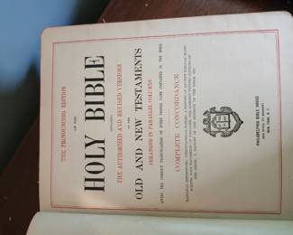 Holman Promoters’ Edition Parallel Bible, early 1900s. Authorized and Revised Versions in side‑by‑side columns. Heavy embossed cover, worn edges, solid binding. Value $35–$60.