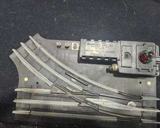 Vintage Lionel No. 1122 Remote Control Switch (1946-1949) for O-27 gauge trains. Includes original Lionel controller and factory box. Complete postwar Lionel accessory used for remote track switching. Estate fresh and collector owned. Asking $95 plus actual shipping costs or local pickup available.