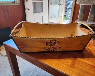 Decorative Faux‑Leather Storage Containers – Sold as a Pair   Includes one purple embossed oval container and one yellow rectangular handled organizer. Faux‑leather/vinyl construction with decorative patterns. Great for home decor, craft storage, or tabletop organization. Condition as shown. EstateSales.net Price: $15  Buyer pays shipping or local pick up