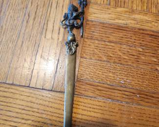 Vintage metal letter openers sold as a group. Includes ornate designs, figural handles, Norway marked piece, lion motif, and decorative blades. Mixed metals, all with detailed craftsmanship. Condition as shown. Buyer pays shipping or local pick up. Price $25 for the group.