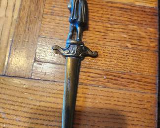 Vintage metal letter openers sold as a group. Includes ornate designs, figural handles, Norway marked piece, lion motif, and decorative blades. Mixed metals, all with detailed craftsmanship. Condition as shown. Buyer pays shipping or local pick up. Price $25 for the group.