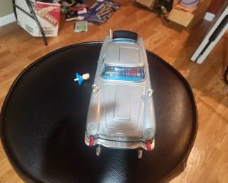 Vintage James Bond Aston Martin DB5 battery-operated toy from Goldfinger and Thunderball (circa 1965-1967). Includes original box and ejector seat figure. Features working bullet-proof shield, machine guns, revolving license plates, ejector seat and other spy gadgets. Excellent collector's item. $695 plus actual shipping or local pickup.