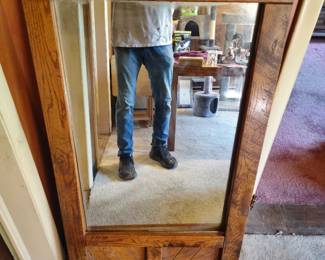 Large rustic wood‑framed mirror with decorative lower panels. Solid construction, clear glass, good condition. Great accent piece for entryway or bedroom. Buyer pays shipping or local pick up. Price $45.