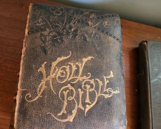 Pictorial Family Bible Large antique Pictorial Family Bible with ornate illustrated title pages and decorative cover. Heavy, detailed, and visually striking. Early 1900s. Value $40–$75.