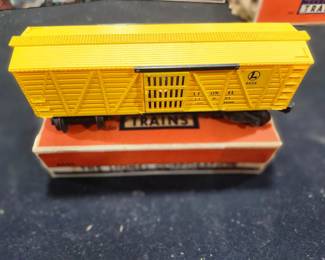 Vintage Lionel Postwar O Gauge Yellow Stock Car (1950s) – Original Lionel box included. Estate fresh and in excellent collector condition with bright original color and sliding doors. A great addition to any Lionel postwar train collection.  Price: $125 plus actual shipping costs, or local pickup available.  Serious inquiries only.