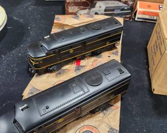 1952 Lionel No. 2032 Erie Twin Diesel Locomotive Pair (NOS). New Old Stock in original master carton with factory tissue paper, inspection tags, and individual boxes. O Gauge postwar Lionel with Magna-Traction. Estate fresh and exceptionally clean. Untested to preserve collector condition. A rare collector-grade matched pair with original packaging. Asking $1,495.