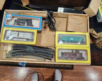 Model Power HO Diesel Ready‑to‑Run Electric Train Set – New Old Stock – Unused – Original Box  Vintage Model Power HO‑scale electric train set, complete and unused, still in the original box. This is true New Old Stock (NOS) — contents appear untouched and never assembled. Includes diesel locomotive, freight cars, track sections, power pack, and accessories. Packaging is clean and intact with clear display windows.  A great collectible for model railroad enthusiasts or anyone looking for a ready‑to‑run HO set in exceptional condition. Hard to find unused examples from this era.  Condition:  New Old Stock (unused)  Original box included  All components present  Box shows only minor shelf wear  Price: $75 Era: Late 1980s–1990s Includes: Locomotive, cars, track, power pack, accessories, original box