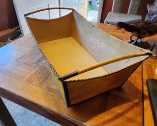 Decorative Faux‑Leather Storage Containers – Sold as a Pair   Includes one purple embossed oval container and one yellow rectangular handled organizer. Faux‑leather/vinyl construction with decorative patterns. Great for home decor, craft storage, or tabletop organization. Condition as shown. EstateSales.net Price: $15  Buyer pays shipping or local pick up