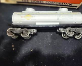 EstateSales.net Description  1954-1957 Lionel No. 6465 Sunoco Two-Dome Tank Car – Postwar O Gauge. New Old Stock and estate fresh in its original Lionel factory box. Collector-grade example featuring the iconic Sunoco graphics and exceptional original finish. A highly sought-after postwar Lionel freight car for serious collectors. $275 plus actual shipping costs or local pickup available.