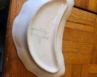 Vintage Japanese Porcelain Shell Trinket Dish  Delicate vintage porcelain shell-shaped trinket dish featuring a scalloped design, soft ivory glaze, hand-decorated floral motif, and gold-accented edges. Made in Japan, this charming dish is perfect for holding jewelry, keys, coins, or other small treasures. It also makes a beautiful decorative accent for a vanity, dresser, or coffee table.  Features:  Vintage Japanese porcelain Shell-shaped design Hand-decorated floral center Gold-accented edges Ideal for jewelry, rings, coins, or display Made in Japan  Approximate Year: 1940s–1960s  Condition: Good vintage condition with light crazing and age-related wear consistent with vintage porcelain. Please review all photos for condition.  Estate Sale Price  $15.00  Shipping  Buyer pays actual shipping. Local pickup is also available.  EstateSales.NET Title