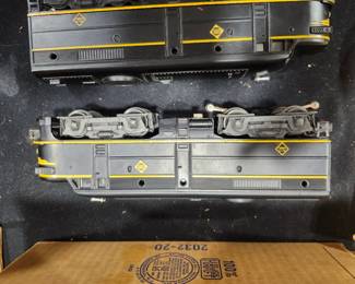 1952 Lionel No. 2032 Erie Twin Diesel Locomotive Pair (NOS). New Old Stock in original master carton with factory tissue paper, inspection tags, and individual boxes. O Gauge postwar Lionel with Magna-Traction. Estate fresh and exceptionally clean. Untested to preserve collector condition. A rare collector-grade matched pair with original packaging. Asking $1,495.