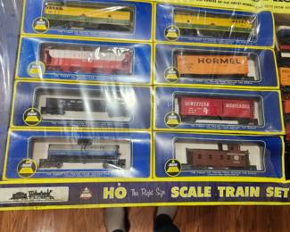 Vintage HO Scale Train Collection. New Old Stock and never opened. Includes numerous locomotives, freight cars, and accessories in original factory packaging and display box. Estate fresh and collector quality. Contents appear complete and unused. Ideal for train collectors or hobby enthusiasts. Asking $495 OBO.