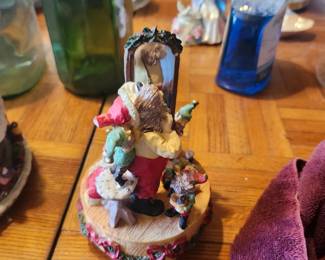 Vintage Santa Claus Christmas Music Box Figurine  Price: $20  Charming vintage Santa Claus music box featuring Santa getting ready in front of a mirror with festive holiday details. A great collectible or Christmas display piece.  Condition: Good vintage condition with light wear from age. Music box sold as found; see photos for condition.  Estimated Value:  Estate Sale: $20 Online: $25–40 Antique Shop: $35–50  Buyer pays shipping or local pickup available.