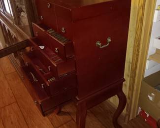 Full set of Brass Flatware in cabinet