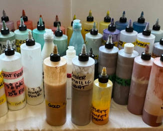 Lot 64: Assorted liquid paints and colorants in squeeze bottles