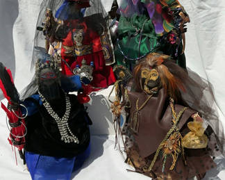 Lot 8: Group of decorative handmade dolls in elaborate costumes