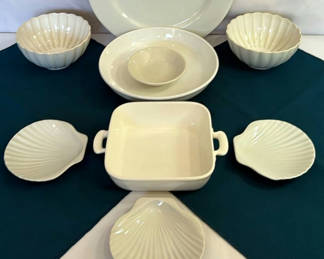 Lot 102: White ceramic shell-pattern dinnerware set with casserole dish