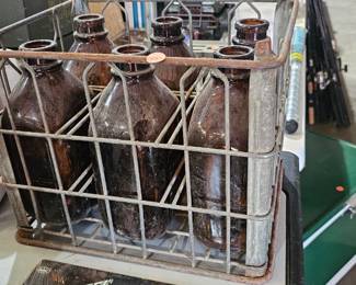 WIRE CRATE / BROWN GLASS BOTTLES