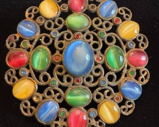 Vintage brooch with moonglow cabochon stones