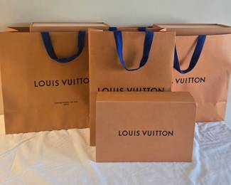 Empty Louis Vuitton bags and boxes