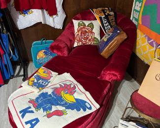 Awesome red velvet chaise lounger… happy among all the great KU memorabilia!!