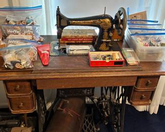 Antique Singer Sewing machines (2), one in sewing cabinet, many sewing accessories, threads, bobbins, etc. plus needlepoint and knitting!