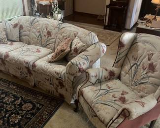 Old floral sofa and chair