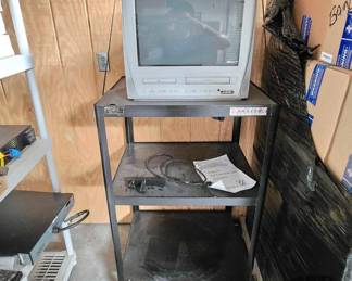 2548  Magavox TV and Wheeled Rack