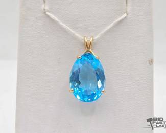 706  14kt Gold Pendant with Topaz 5.7g