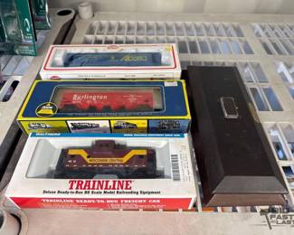 5038  3 HO Scale Trains and 2 Display platforms