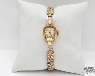 1100  14kt Bezel Bulova Watch