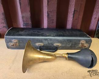 6052  Locked Instrument Case and Broken Horn