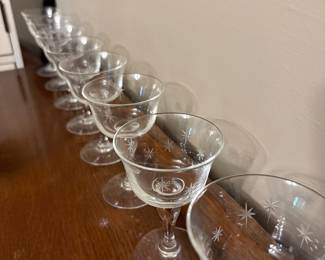 Etched starburst champagne glasses