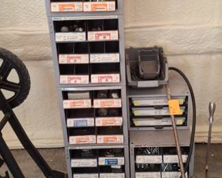 Each box different types of fasteners, nuts, washers... Free standing