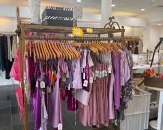 $11 clothing rack includes wooden hanger