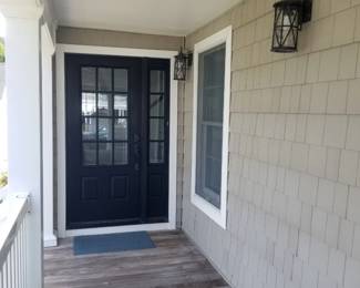 Entry door; decking; siding