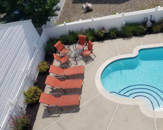 Pool chaises - 4 available. Patio dining set seats 4