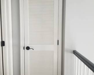 Louvered door