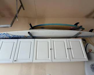 Garage cabinets; 2 surfboards