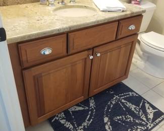 Bath vanity; area rug