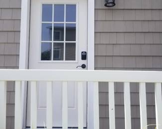 Entry door with electronic lock; siding; exterior lights