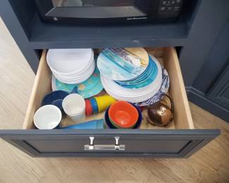 Kitchen island feature: pull out drawers; plastic ware