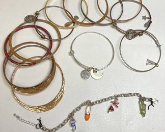 Copper Colored Bangles And Other Bracelets