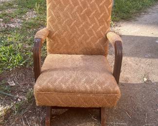 Child’s upholstered rocking chair