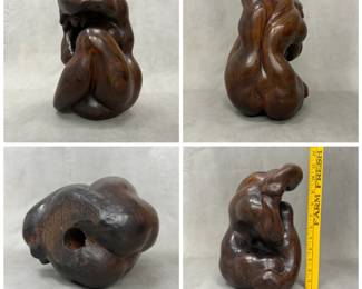 More views of the hand-carved wooden sculpture of seated female figure, 11 inches tall, with polished dark wood finish with prominent natural grain patterns