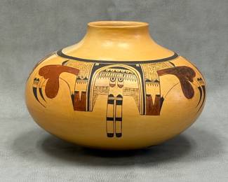 A traditional, wide yellow-ware Hopi olla pot with Sikyátki designs, with a narrow neck; mid/late 20th century; approximately 8-1/4 inch tall, signed to underside by master potter Priscilla Namingha Nampeyo  (1924-2008, Hopi-Tewa)