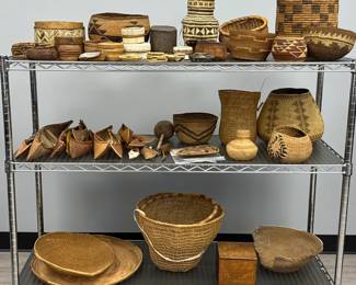 Some of the collection of Native American and southeast Asian baskets available at this sale - including from Klamath, Hupa, Tahons O'odham, Chippewa, Tsimshian, Yurok,  Shagton Group/Pit River, Pima/Akimel O'odham, Shastan, Mi'kmaq, Makah; Thailand