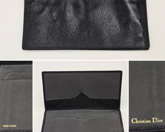 A vintage Christian Dior black leather long wallet or checkbook cover, made in Spain